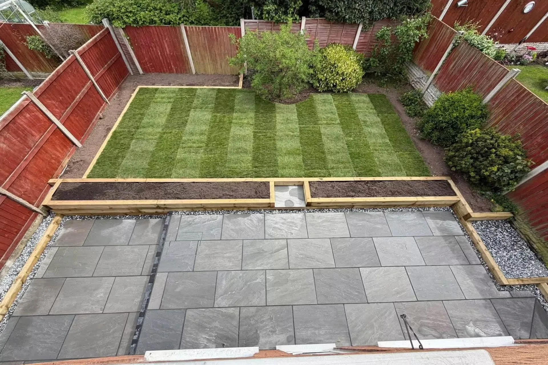A new lawn, patio and sleeper beds by Ace & Sons, seen from above
