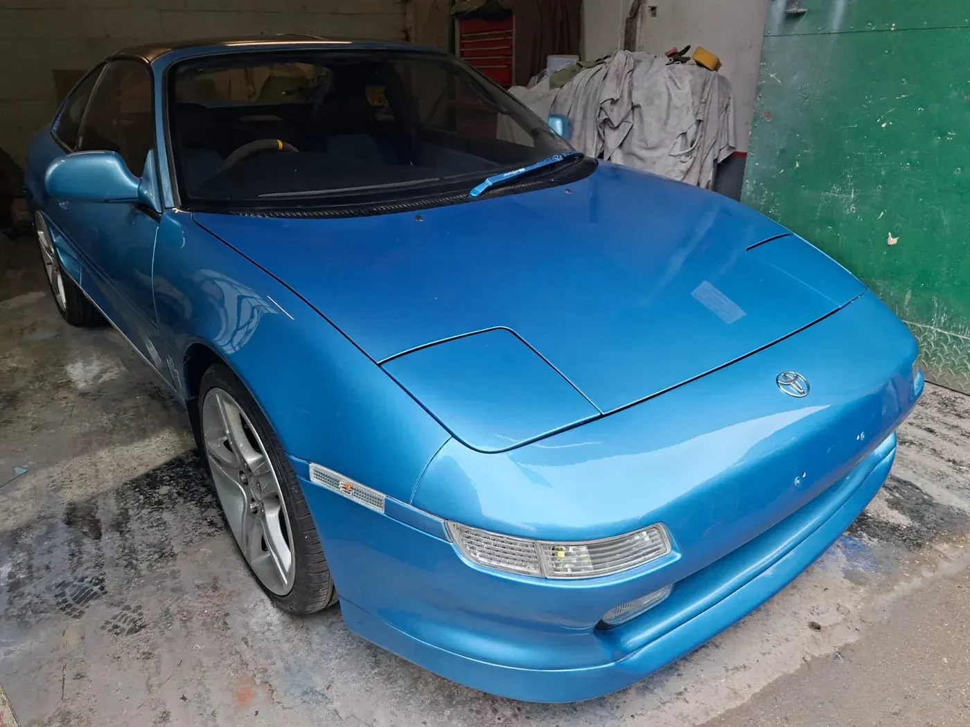 A blue sports car after bodywork and a respray by Apex Auto Detailing