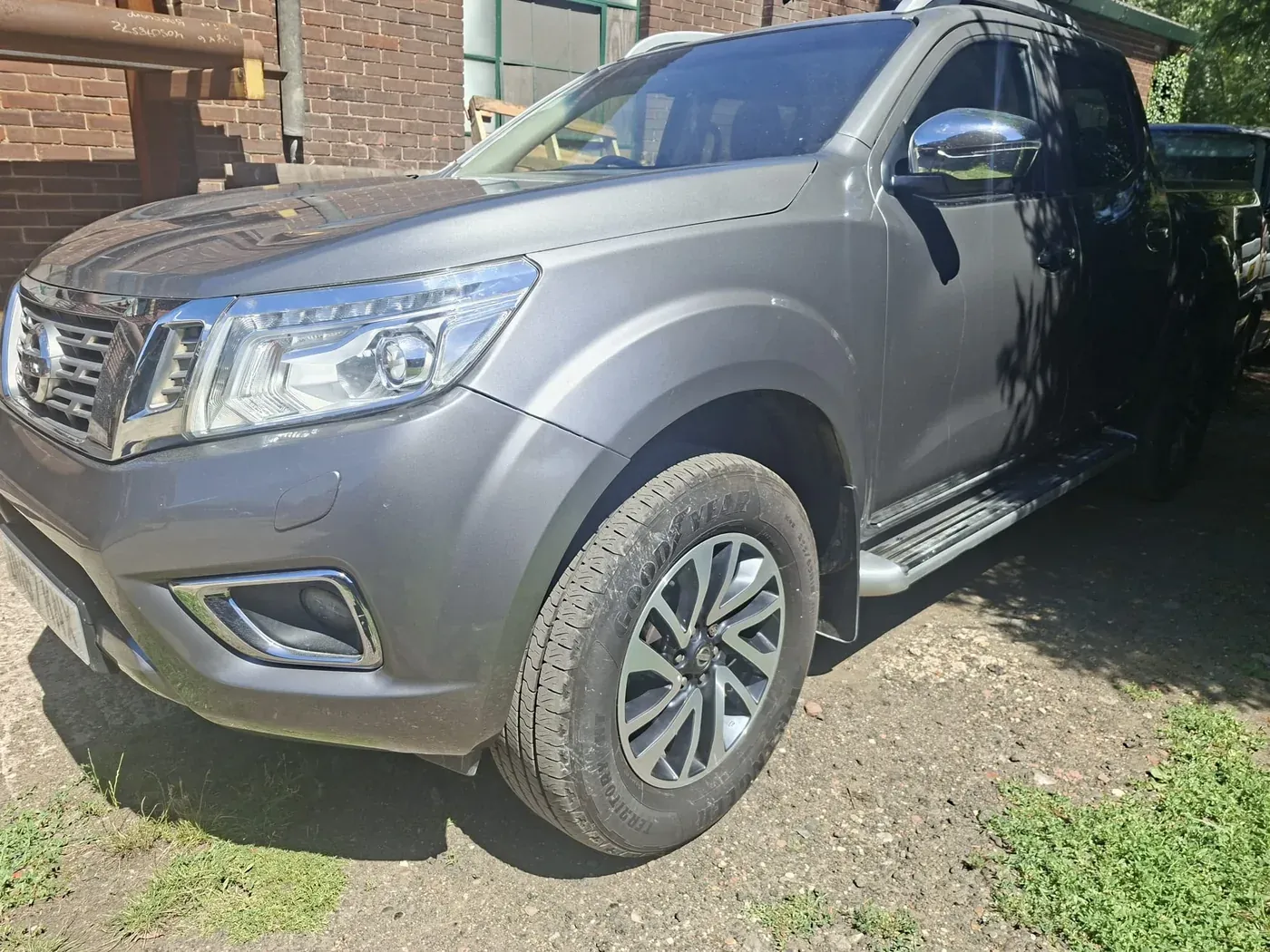 A grey pickup after bodywork by Apex Auto Detailing