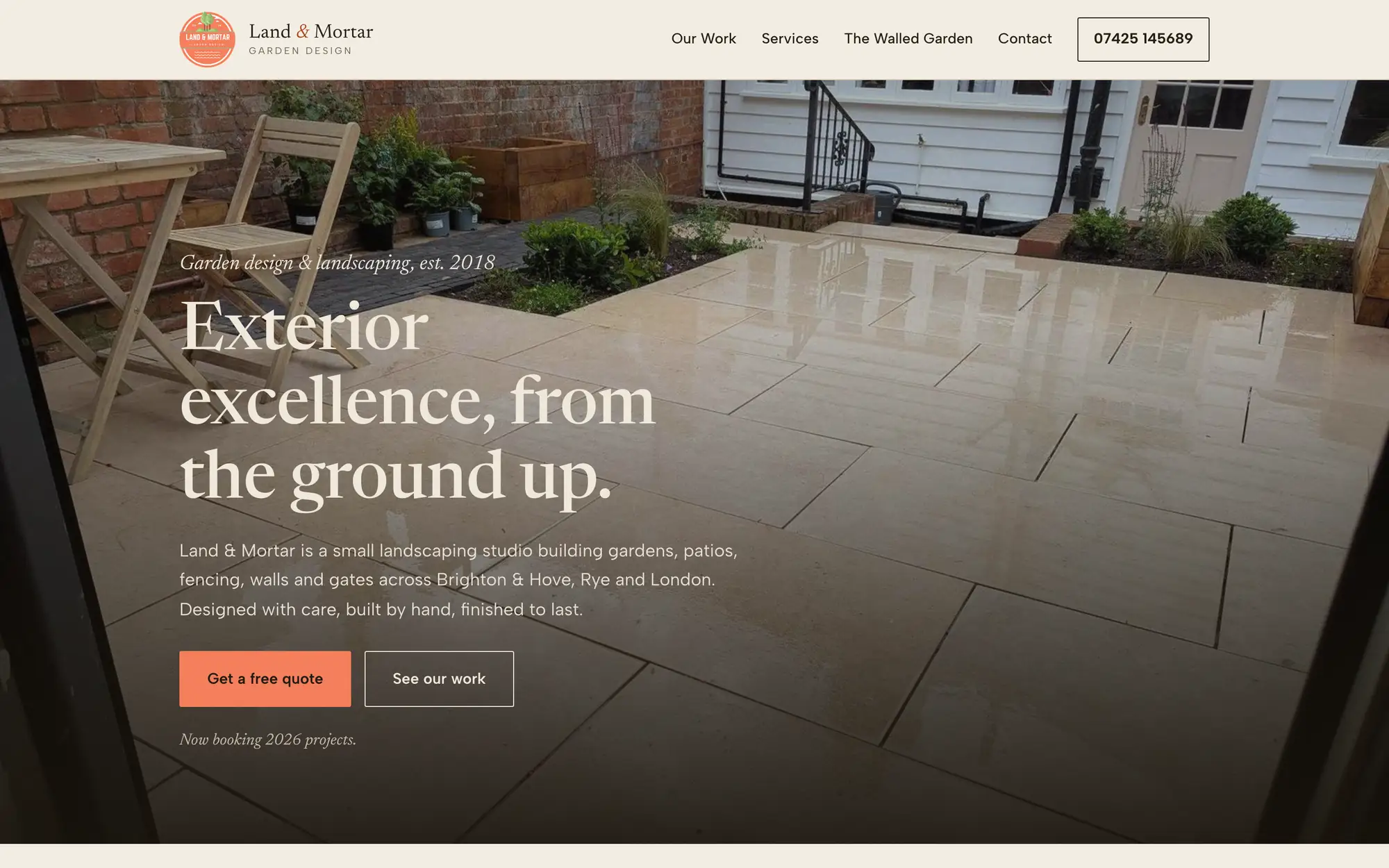The Land and Mortar homepage: a garden design studio in Brighton and Hove, opening on a finished stone patio